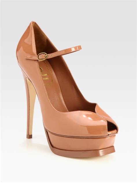 ysl tribute patent leather platform pumps|TRIBUTE platform sandals in patent leather .